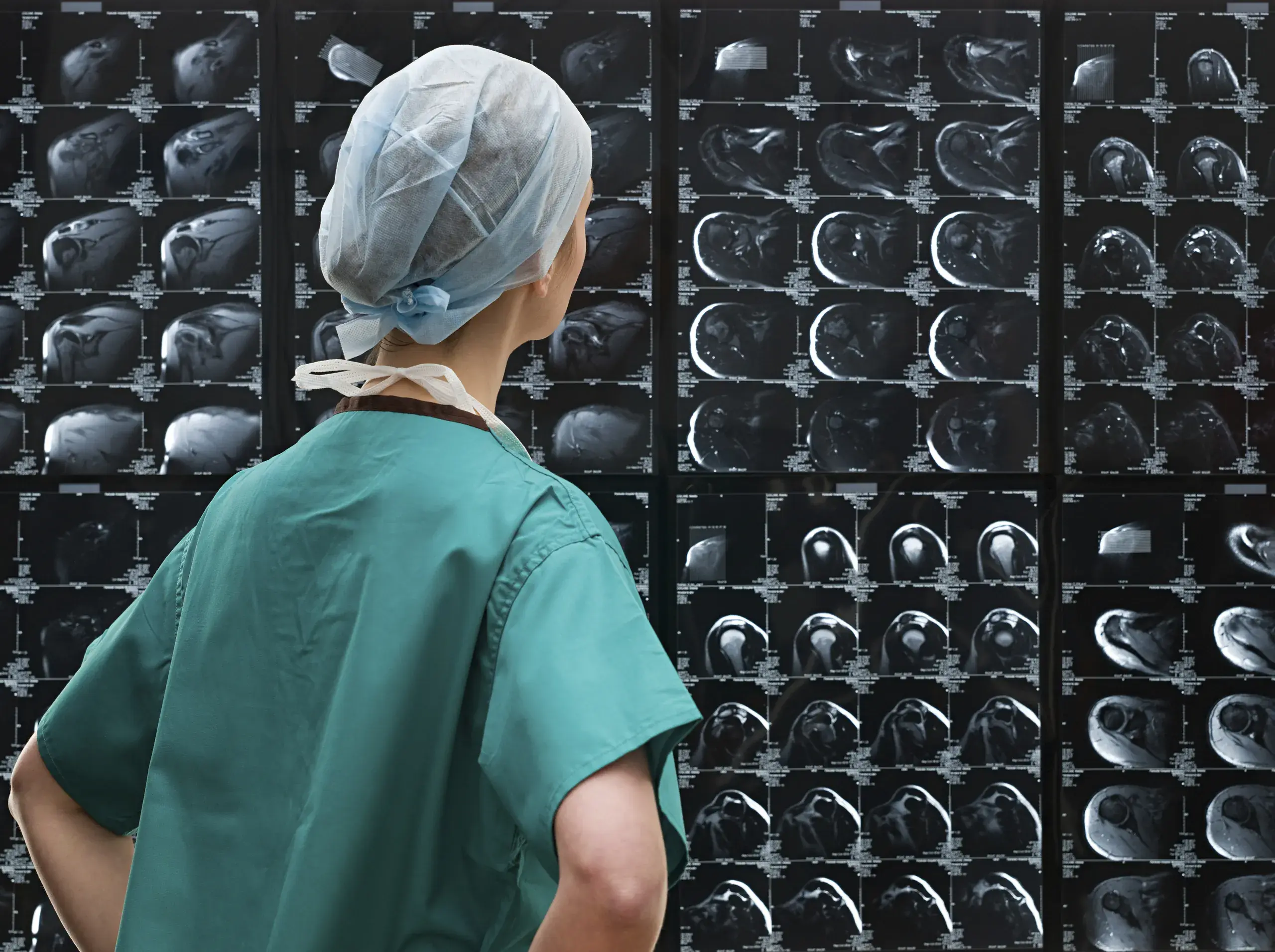 Radiologist reviewing medical images