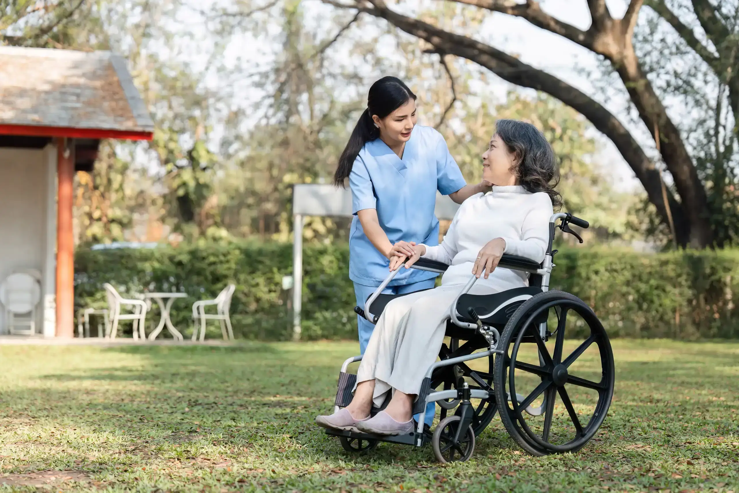 Senior care staff supporting a resident