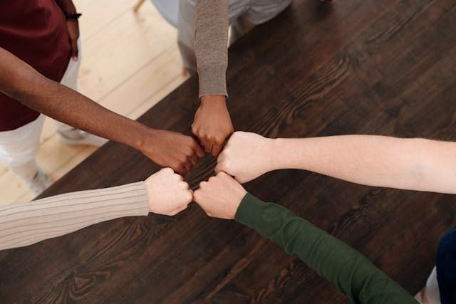 happy team fist bump