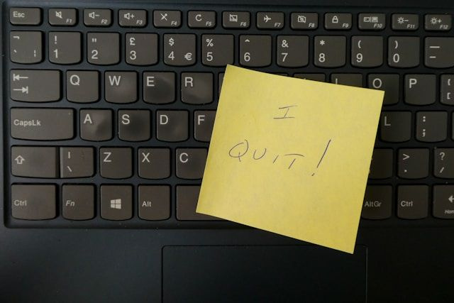 quit sticky note on keyboard