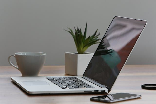 laptop and mobile on a table