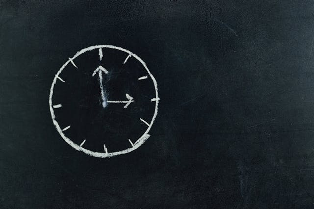 clock drawn in chalk