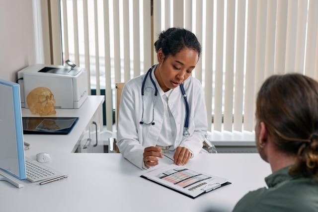nurse talking to a patient