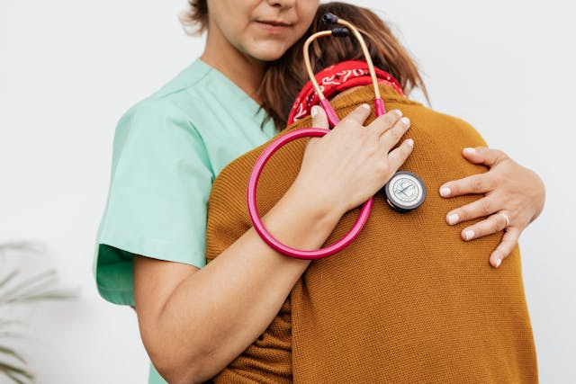patient and nurse hugging