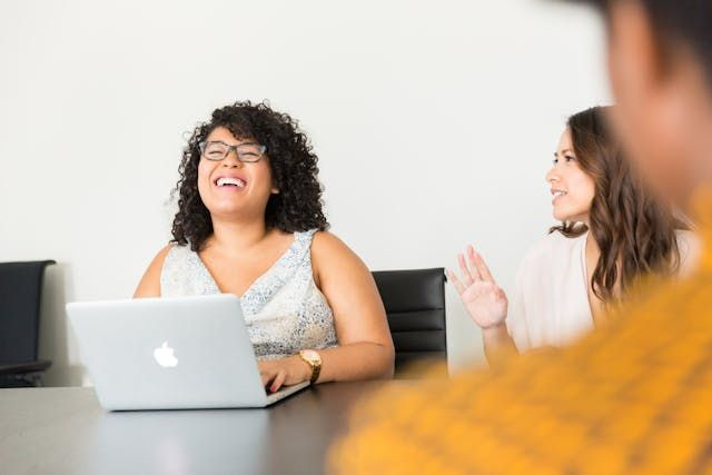 co-worker laughing
