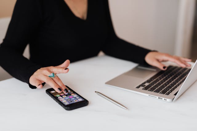 women on laptop and mobile working